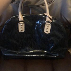 Black patent monogram Michael Kors bowling bag